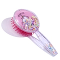 Dettaglio della spazzola rosa trasparente con motivo unicorno e perline fluttuanti - Pony