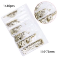 Detail of 1440pcs mixed size Aurora gold K9 crystal nail rhinestones in 116x76mm bag - Ghost Light