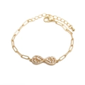 Bracciale hip hop infinito dorato con zirconi bianchi su sfondo bianco pulito e chiaro - Stile Infinito C / Oro