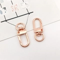 Porte-clés cœur en or rose avec mousquetons à ressort et anneaux en D rotatifs - Porte-clés / Or rose