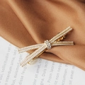 Golden alloy bow hair clip featuring small pearls and rhinestones on silk fabric - Pearl Crisscross Bow Spring Clip