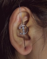 Silver crescent moon and triangle zircon crawler earring on model ear side view - C-Shape Moon Triangle Zirconia Style (8347)