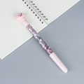Pink cartoon pig head glitter pen with pink sequins on a grid notebook background - Small-eyed Pig