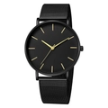 Detail of ultra-thin black mesh strap watch with minimalist gold markers and hands - Black Case Black Dial Gold Hands