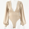 Detail view of beige deep V-neck bodysuit with bishop sleeves and pleated waist design - Khaki