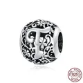 Hollow S925 sterling silver charm bead with floral pattern and letter F for DIY bracelets - 925 Silver / Letter T