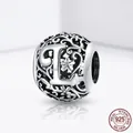 S925 sterling silver hollow ball charm featuring letter L and intricate floral patterns - 925 Silver / Letter L