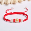 Handmade red cord bracelet with a glowing zodiac pig charm and adjustable sliding knots - Red Rope [Pig]