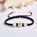 Handmade black cord bracelet with three white beads and a golden dragon pattern - Black Rope [Horse]