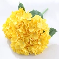 Single stem artificial yellow hydrangea flower with green leaves and realistic texture - Yellow
