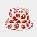 Close-up of white cotton bucket hat featuring cute cartoon strawberry print patterns - M (56-58cm) / Strawberry Pattern White