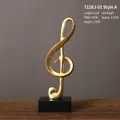Scultura moderna a chiave di violino dorata con base nera per decorazioni da ufficio - Chiave di Violino Stile A / 6.1x4.3x17.8cm
