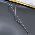 Minimalist silver geometric triangle ear crawler cuff with polished metallic finish - Cross Triangle Silver