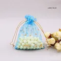 Lake Blue organza gift bag with gold star and moon patterns for jewelry packaging - Lake Blue