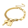 Gold plated thick chain bracelet featuring heart key and padlock charms with lobster clasp - Gold Asymmetric Chain (KB139523-Z)