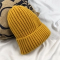 Winter knitted beanie in bright ginger yellow with thick thermal wool for warm ear protection - M (56-58cm) / Yellow