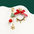 Detail of asymmetrical Christmas earrings with plush ball, bow and star charms - No.6 Christmas Tree Clip-on Earrings