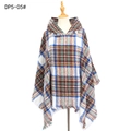 Plaid hooded poncho with tassels in brown and blue tartan on fashion model - Natural White Rainbow Plaid