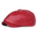 Side view of a vintage red leather newsboy cap with a classic stitched crown and button top - Red