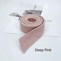Detail view of deep pink wool coat belt featuring high-quality topstitching and texture - Pink