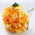 Vibrant yellow-orange gradient artificial hydrangea bouquet with 5 heads and green leaves - Orange
