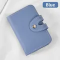 Porta carte blu capiente in pelle con trama litchi e chiusura con fibbia argentata - Blu