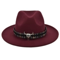 Detail of wine red felt fedora featuring an ethnic woven band and silver bull head charm - M (56-58cm) / Burgundy