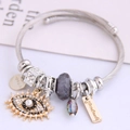Silver cable wire bangle with evil eye charm, pearls, and engraved pendants for women - Gray