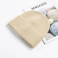 Minimalist beige ribbed knit beanie hat in soft warm winter thermal style - Beige