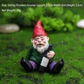Nain de jardin ivre en résine avec bonnet rouge pour décoration de paysage de Noël miniature - Nain ivre assis