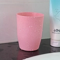 Minimalist pink speckled plastic mouthwash cup with realistic water droplets on surface - 350ml / Nordic Pink