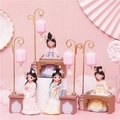 Cute ancient Hanfu girl figurine set in pink dress playing the guqin on a soft pink base - Four Arts with Lanterns Set