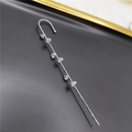 Silver crawler earrings with six round cubic zirconia stones on dark background - Six Zircon Silver