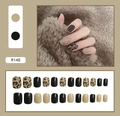 Detail view of 24pcs leopard print and black press-on nails with product code R148 - Camel Leopard Black Patchwork Style (R148)