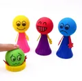 Colorful light-up spring bounce toys with emoji faces in yellow, red, blue, and green colors - Small Jump Elf