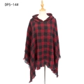 Red and black plaid hooded poncho with decorative tassels on a wooden mannequin - Red and Black Plaid