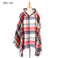 Red and navy plaid hooded poncho cape with tassel fringe on a wooden mannequin - White Red