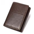 Close-up of brown genuine leather texture with RFID blocking shield logo and fine stitching - 5002 Coffee