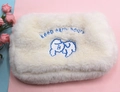 Detail of plush cosmetic bag with dog embroidery and keep early hours text on white fleece - White Dog