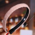 Pink plush headband measuring 15.5cm in diameter with smooth black plastic inner lining - Pink (Plush)
