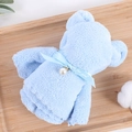 Sky blue coral fleece towel folded into a bear shape with a pearl bow ribbon - Blue (35*75)