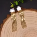 Baroque pearl earrings with long gold tassel fringe on rustic wood display - Pearl Tassel Earrings