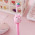 Pink cartoon gel pen featuring a cute hamster mascot with a strawberry accessory - Pink Cat Hamster with Strawberry