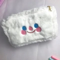 Cute plush cream cosmetic bag featuring an embroidered smiley face and a pearl zipper pull - White Smile Face