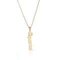 Macro detail of gothic style Aquarius word pendant in polished golden stainless steel - Gold Aquarius