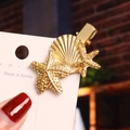 Golden starfish and shell hair clip with metallic texture on white display card - Shell Starfish 3-Piece Set / Gold