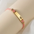 Bracciale in corda intrecciata rosa con placca curva dorata, cuore traforato e perline - Cuore Traforato / Cuore Rosa
