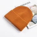 Orange ribbed knit beanie with cuffed brim for winter warmth in minimalist style - Orange Yellow