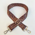 Close-up of leopard print canvas strap with adjustable golden metal buckle and swivel hooks - Pattern 49 Gold Clasp