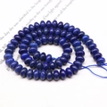 Macro view of blue natural stone abacus beads showing deep texture and flat round shape - 4*6mm 1 Strand (Approx 90pcs) / Lapis Lazuli